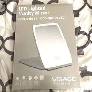 NWT vanity mirror in box Visage LED lighted
Travel Mirror Lightweight Compact